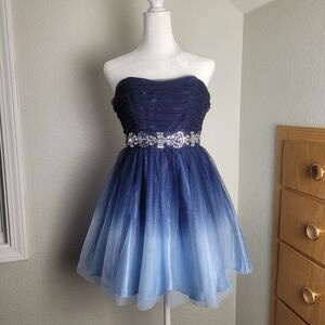 B. Smart elegant blue hombre dress with embellished waist.